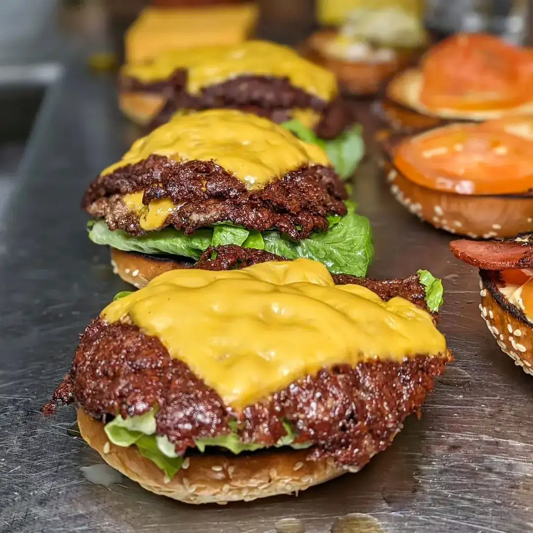 Nashville hot fried chicken sandwich stacked tall with pickles